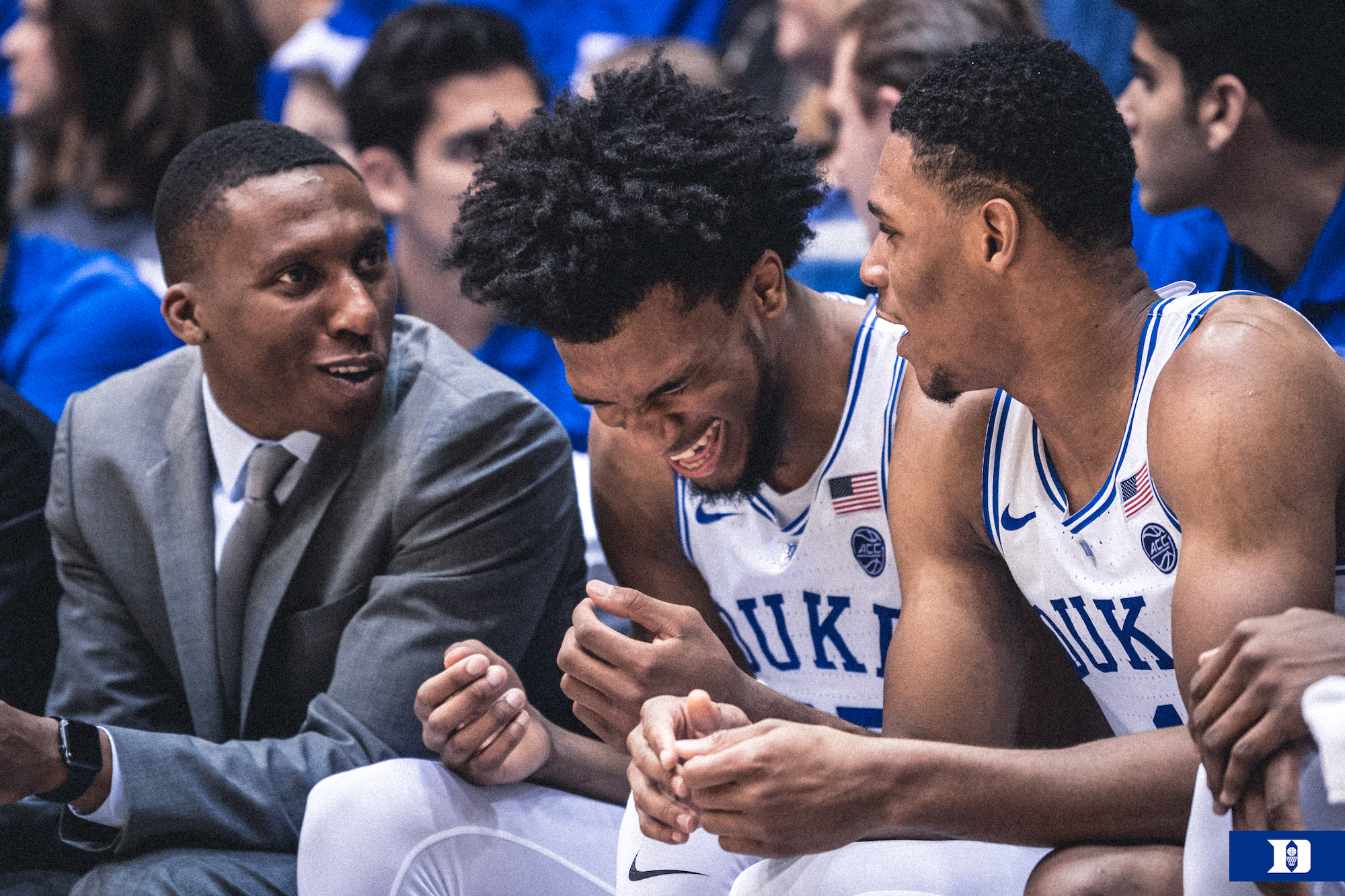 Nolan Smith on bench with players